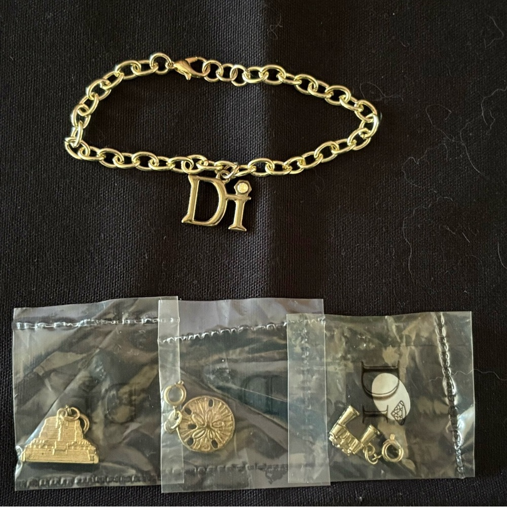 Diamond International Gold Charm Bracelet Set. 8 bracelets multiple charms. - Picture 9 of 15